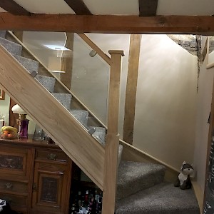 oak staircases Norfolk with modern glass design