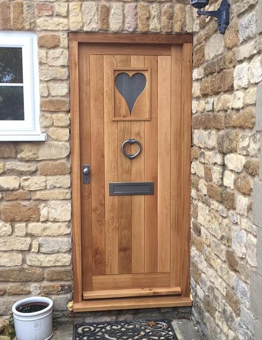 Bespoke oak door with glass feature