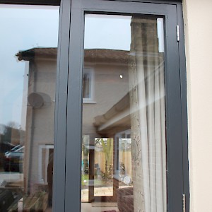 Timber window painted in Grey