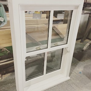 White sash wooden window in our workshop in Norfolk.