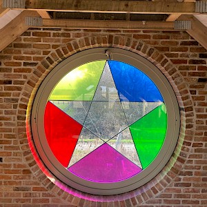 pivot window with stained glass.