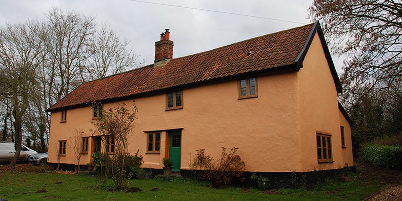 Exterior view of Hunters Cottage, Norfolk complete with Oak Framed Windows, Doors and Garage