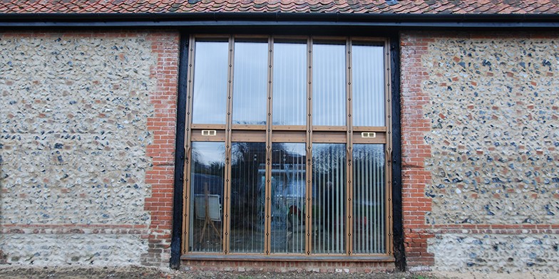 Large Bespoke oak framed window designed for Old Flint Barn, Norfolk