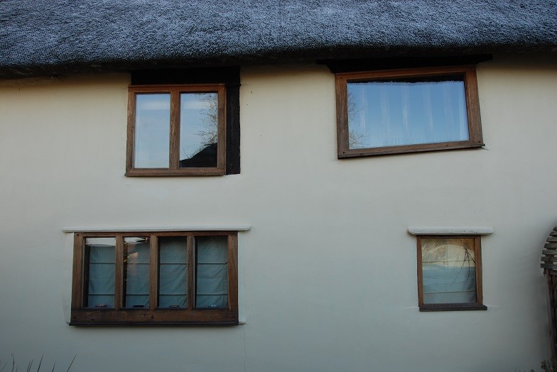 Side view of House with newly installed Oak windows, Norfolk