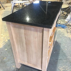 Kitchen island made in solid oak.